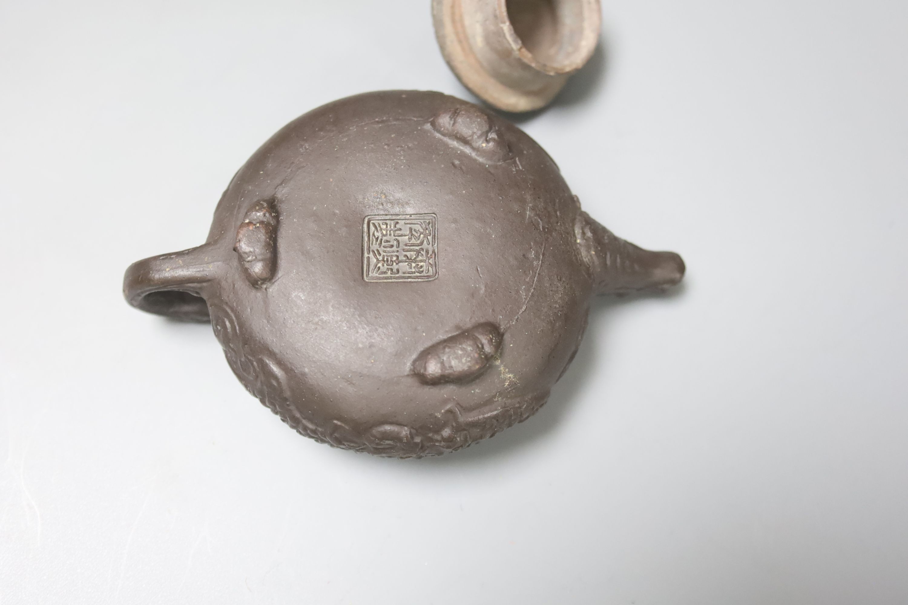 Two 19th century Chinese Yixing teapots (no covers) and a later Yixing miniature teapot